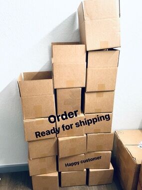 Stack of Brown Cardboard Shipping Boxes - Ready to Ship